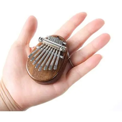 8 Key Mini Kalimba exquisite Finger Thumb Piano Marimba Musical good accessory Pendant Gift 8 Key Mini Kalimba exquisite Finger Thumb Piano Marimba Musical good accessory Pendant Gift