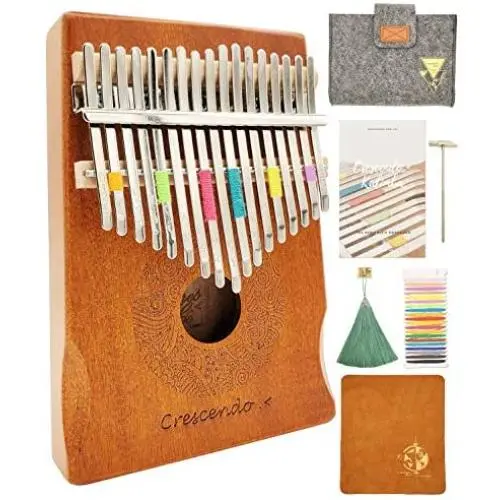 Crescendo & Co 17 Key Thumb Piano Kalimba Mbira made with natural Mahogany wood, portable with carrying case, tuning hammer, DIY decorative thread, Song Ebook, cleaning wipe, and decorative tassel. Crescendo & Co 17 Key Thumb Piano Kalimba Mbira made with natural Mahogany wood, portable with carrying case, tuning hammer, DIY decorative thread, Song Ebook, cleaning wipe, and decorative tassel.
